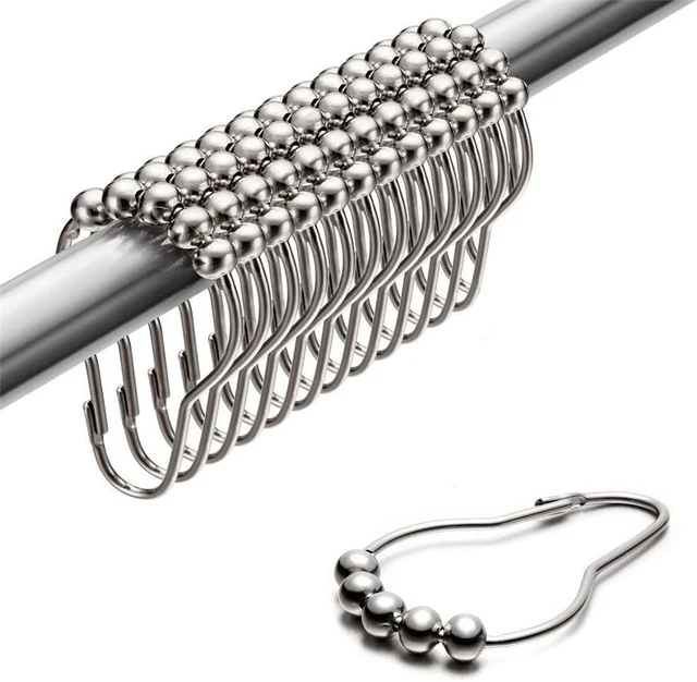 Twelve polished chrome roller-ball shower curtain rings on a rod